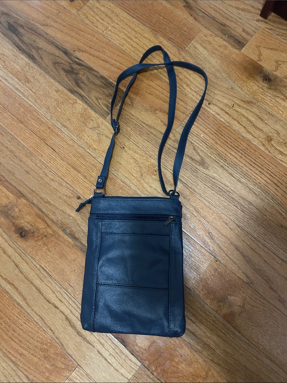 Dark blue leather crossbody bag